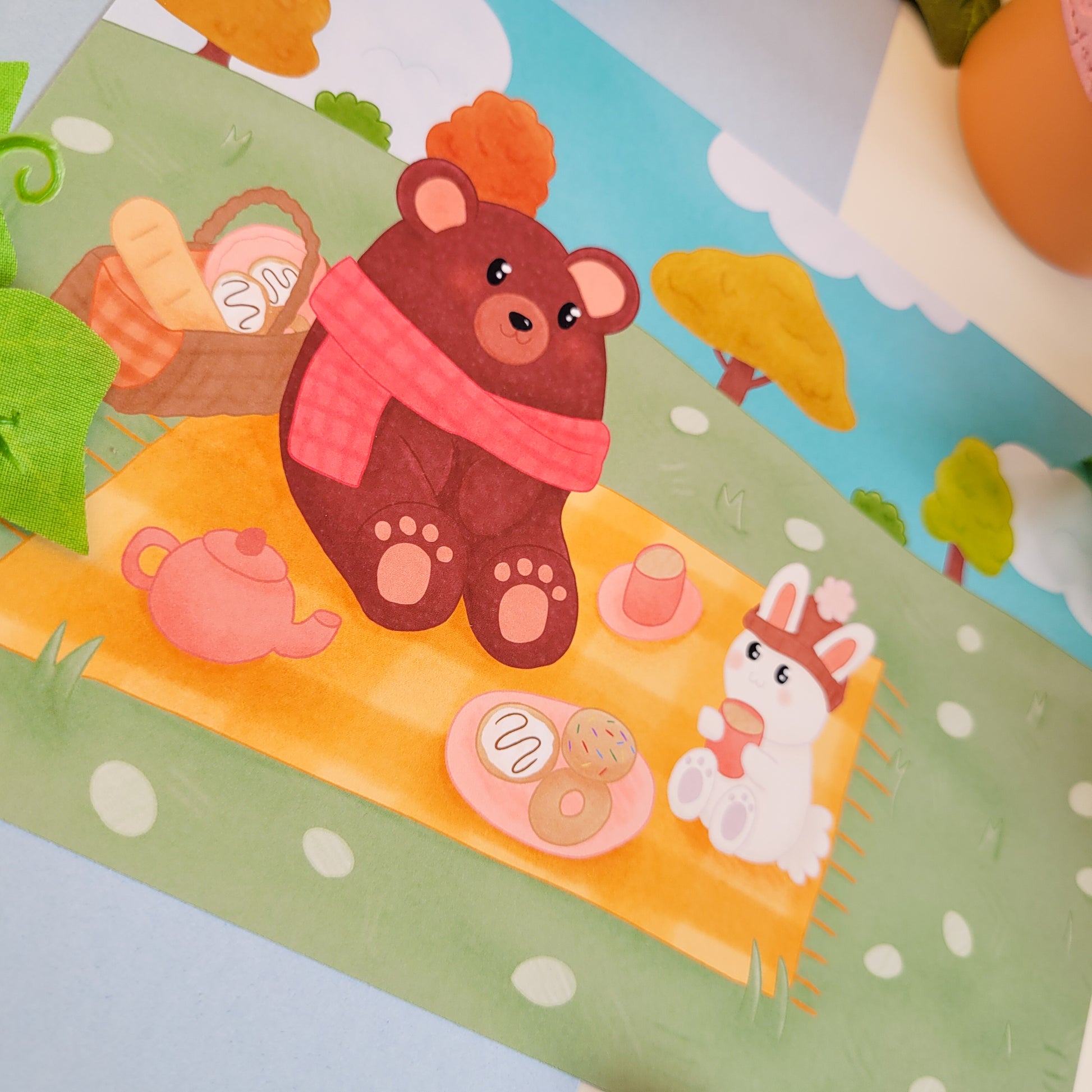 Adorable autumnal art print poster featuring a bear and a rabbit having a picnic