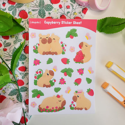 a stickersheet featuring cute capybaras, strawberries, flowers and butterflies