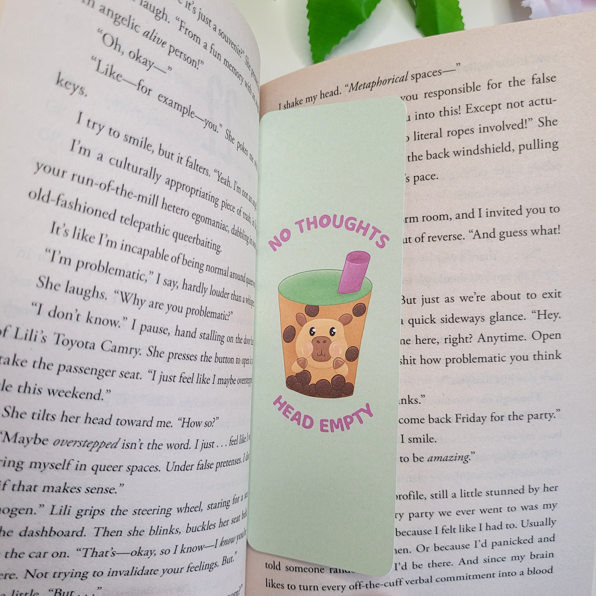 Cute green bookmark featuring a capybara in a bubble tea with the text "No thoughts head empty"