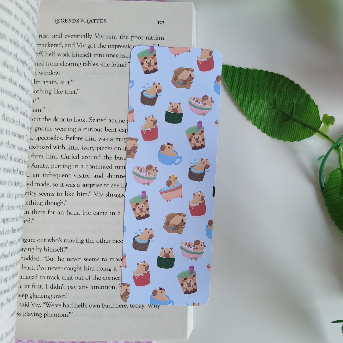 Cute bookmark featuring a design of silly capybaras in things