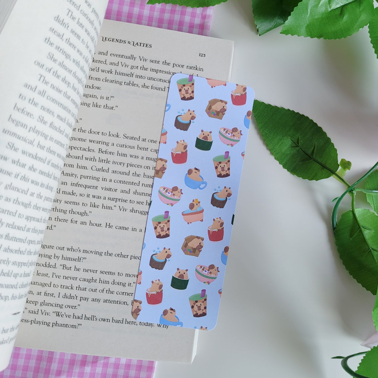 Cute bookmark featuring a design of silly capybaras in things