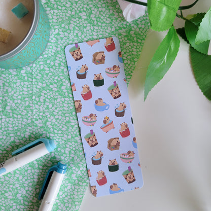 Cute bookmark featuring a design of silly capybaras in things