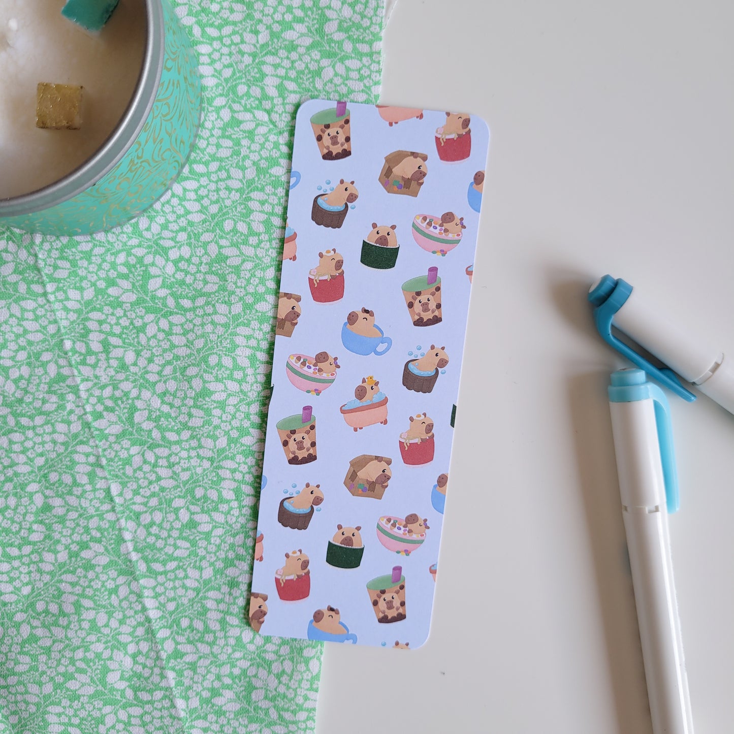 Cute bookmark featuring a design of silly capybaras in things