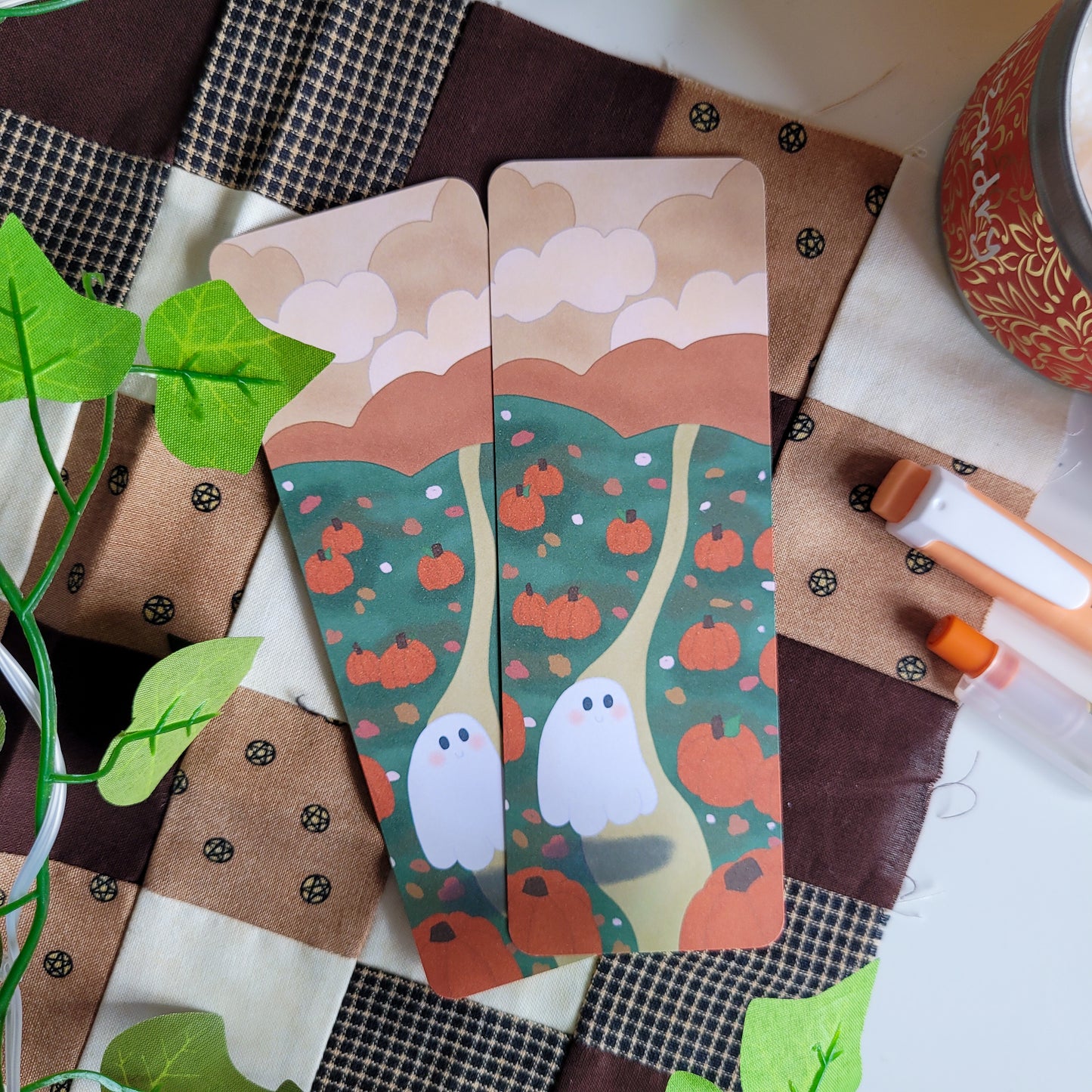 Cute ghost exploring a pumpkin patch bookmark