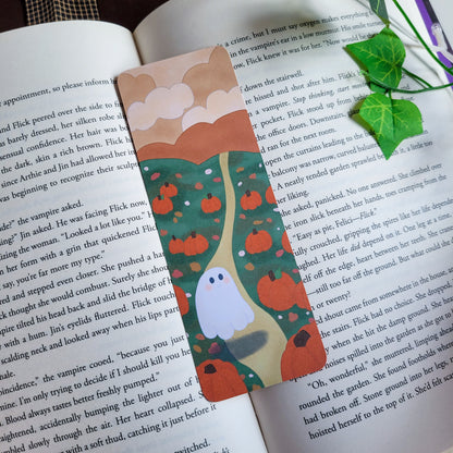 Cute ghost exploring a pumpkin patch bookmark