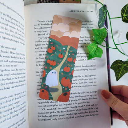 Cute ghost exploring a pumpkin patch bookmark