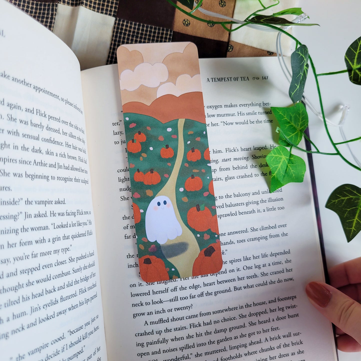 Cute ghost exploring a pumpkin patch bookmark