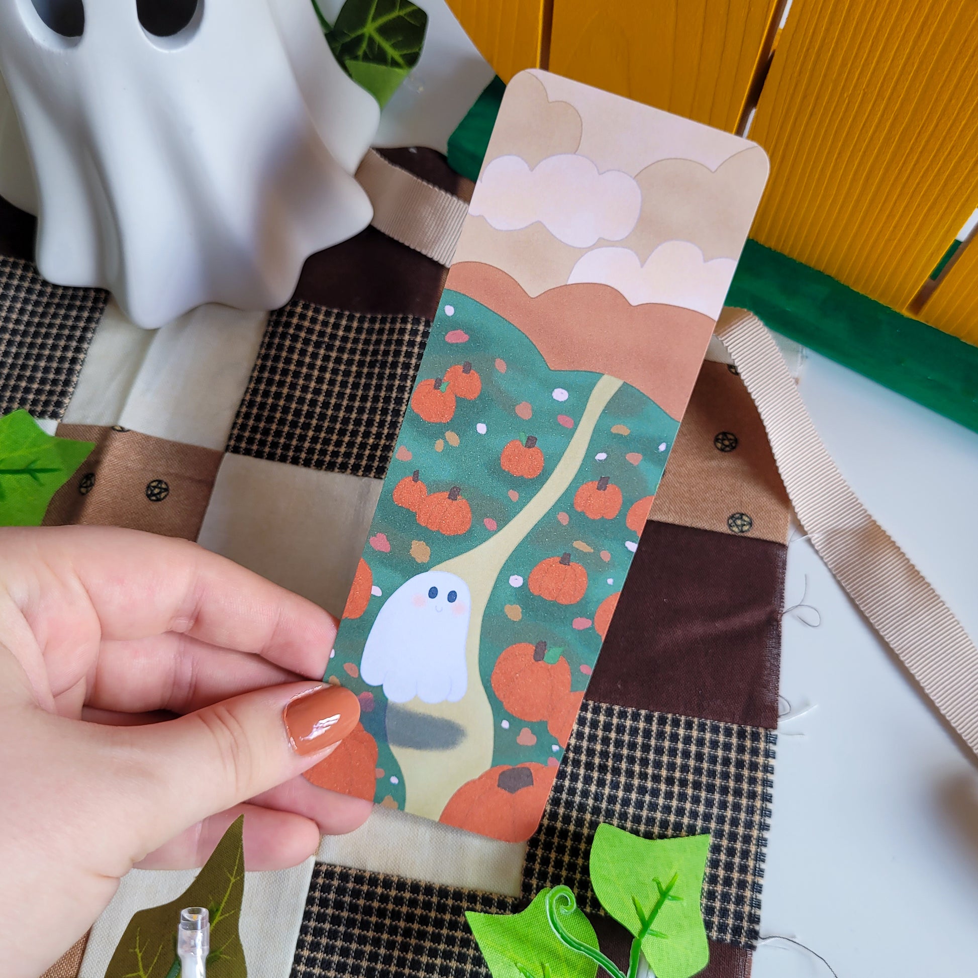 Cute ghost exploring a pumpkin patch bookmark