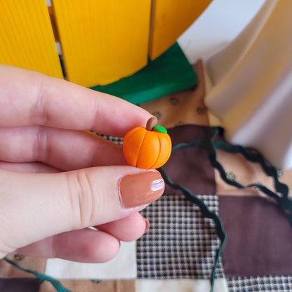 Pumpkin pin badge made out of polymer clay