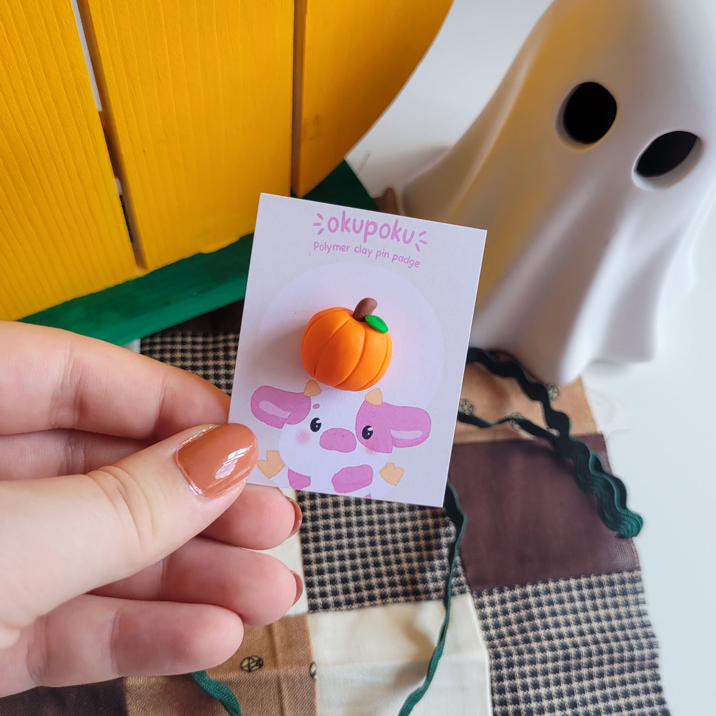 Pumpkin pin badge made out of polymer clay