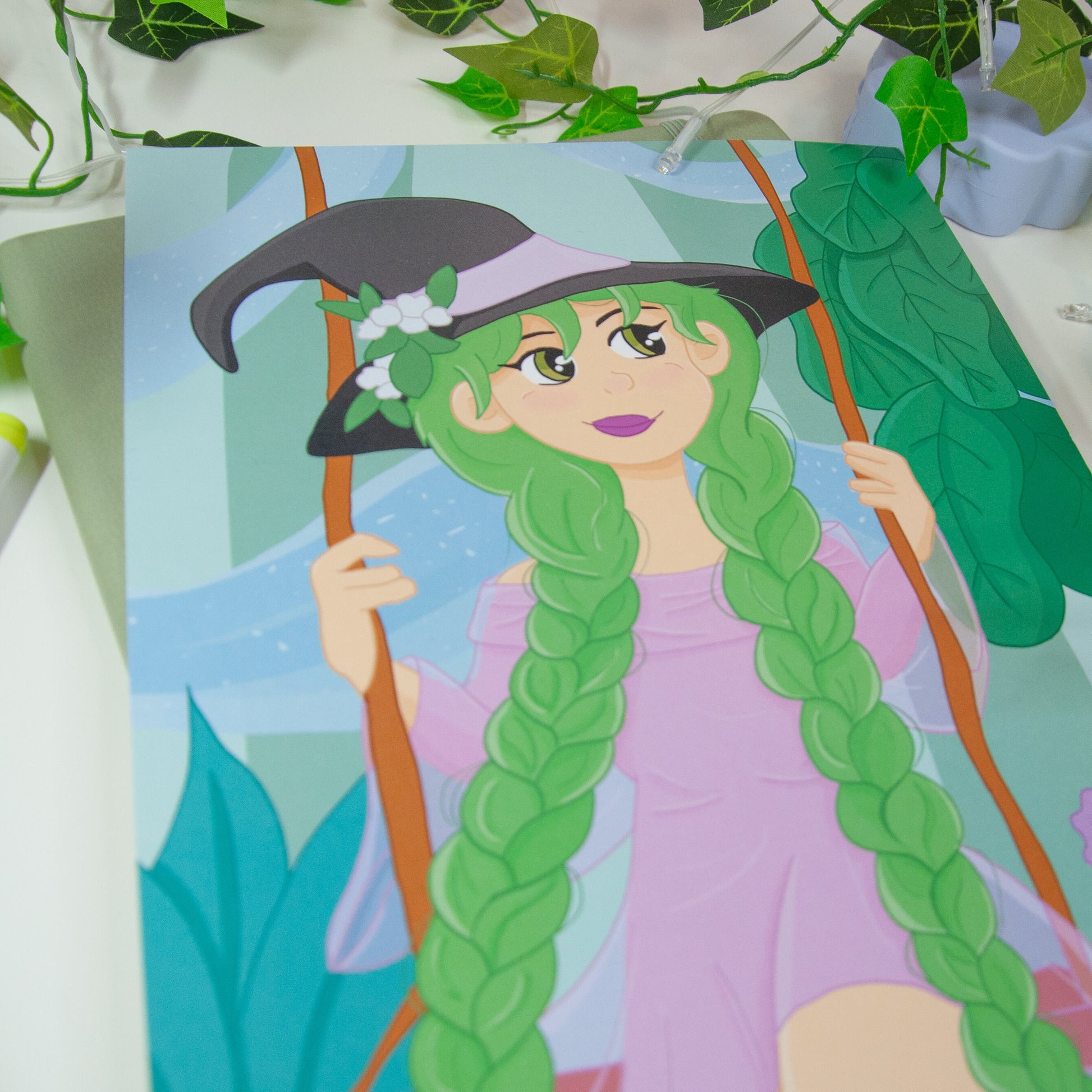 Art print of a witch character sat on a swing in a magical garden