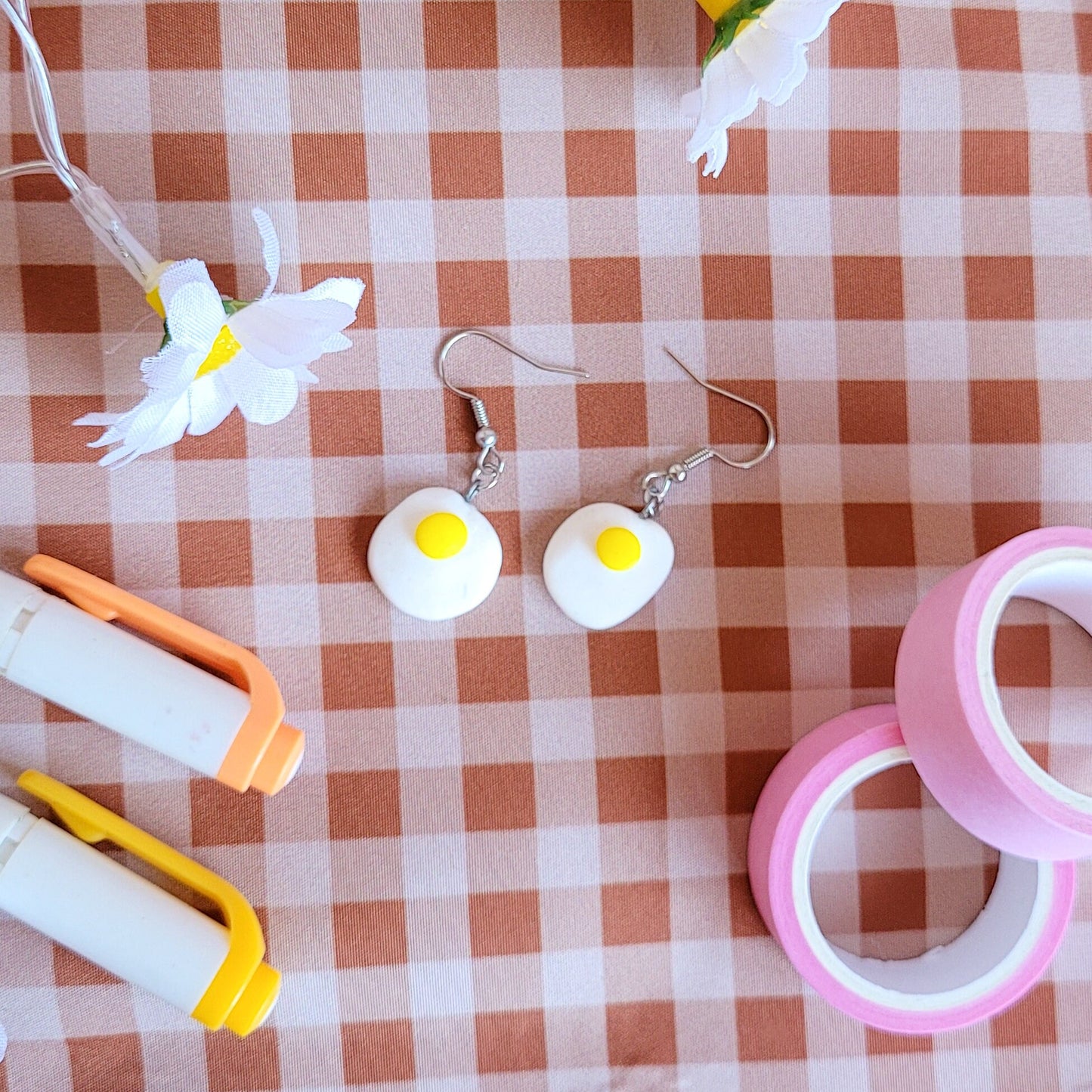 Cute and unique fried egg earrings made out of polymer clay