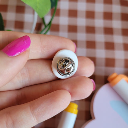 Cute and unique fried egg pin badge made out of polymer clay