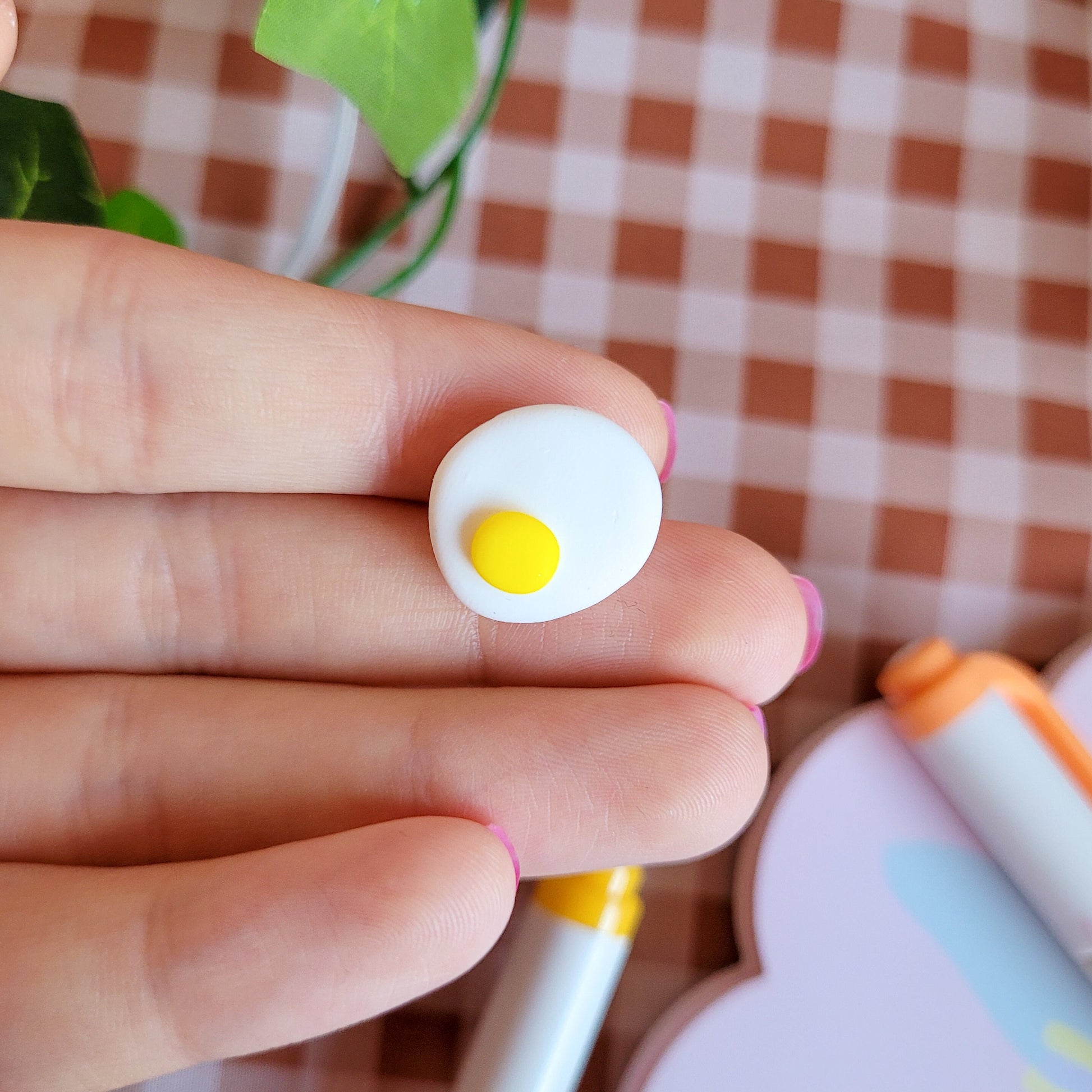 Cute and unique fried egg pin badge made out of polymer clay