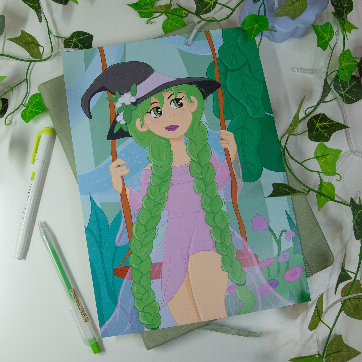 Art print of a witch character sat on a swing in a magical garden