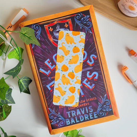 Cute Autumn bookmark featuring cats dressed as pumpkins