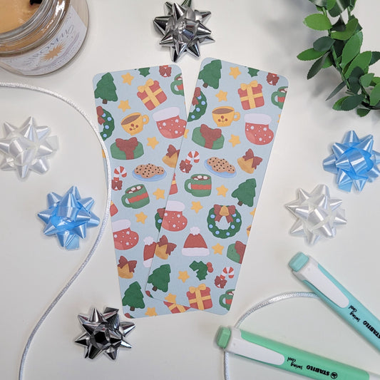 cute christmas themed bookmark featuring a christmas tree, hot chocolate, present, stocking, wreath, santa hat and more