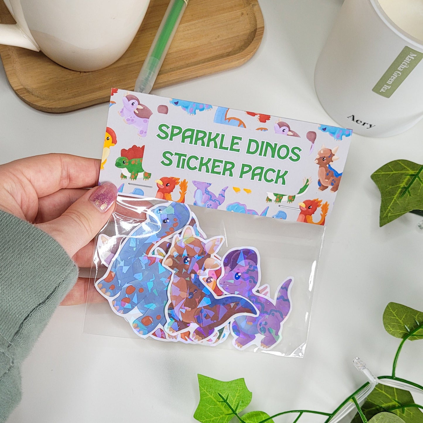 cute sticker pack containing 8 stickers of different dinosaurs