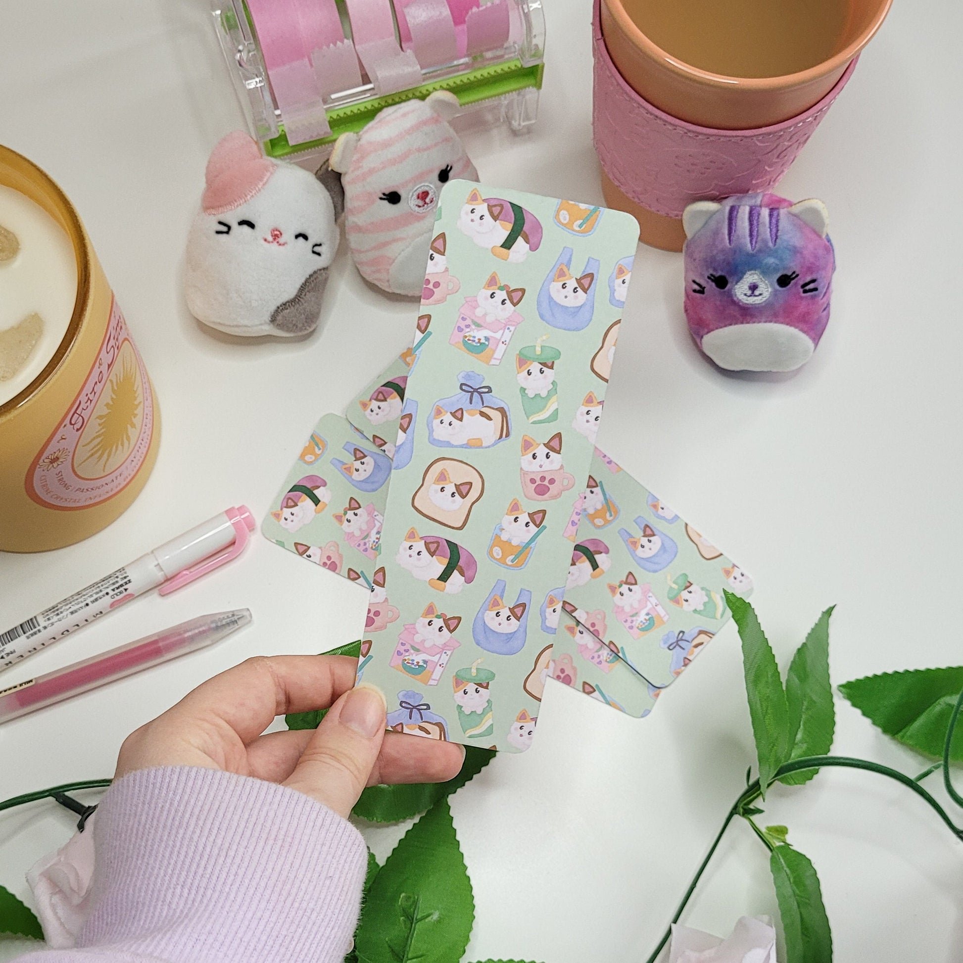 A cute bookmark featurong silly cats