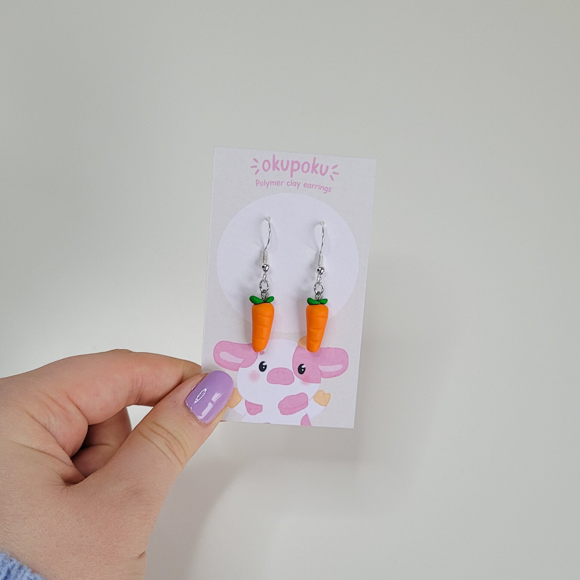 carrot earrings handmade out of polymer clay